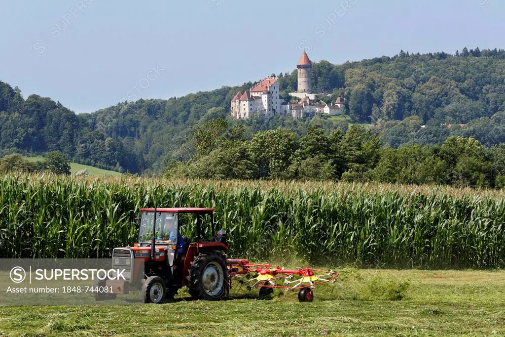 Tractor with tedder in front of Burg Clam Castle, Klam, Muehlviertel region, Upper Austria, Austria, Europe, PublicGround