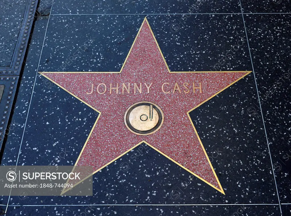 Terrazzo star for the artist Johnny Cash, music category, Walk of Fame, Hollywood Boulevard, Hollywood, Los Angeles, California, United States of Amer...