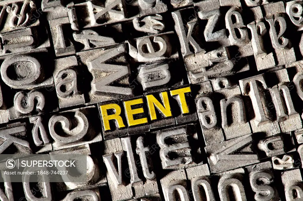 Old lead letters forming the word RENT