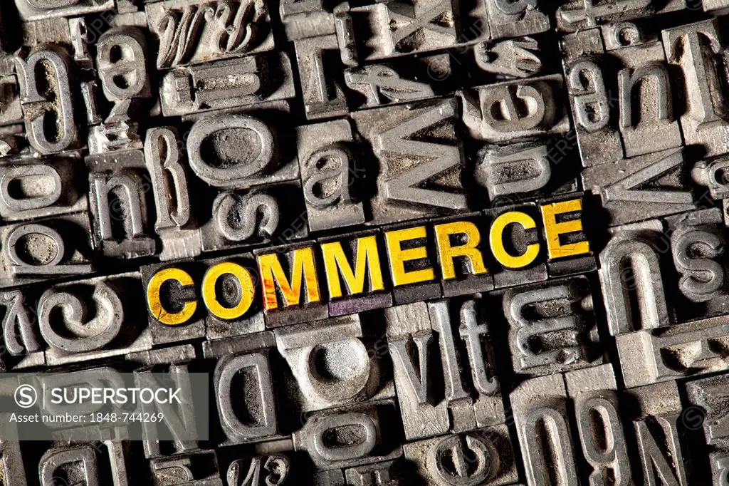 Old lead letters forming the word COMMERCE