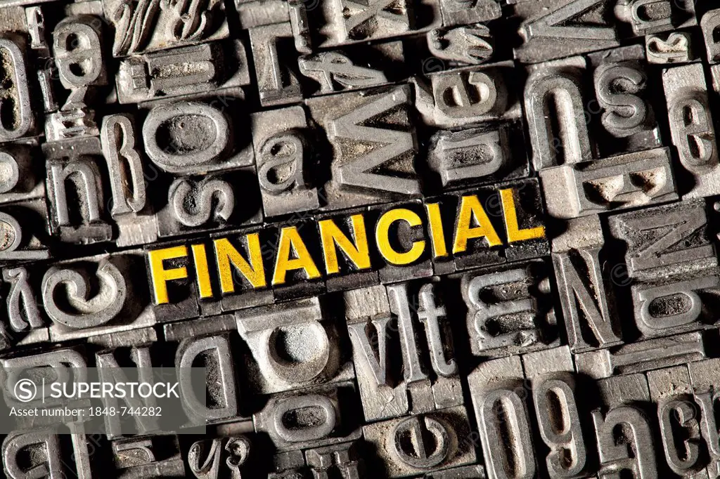 Old lead letters forming the word FINANCIAL