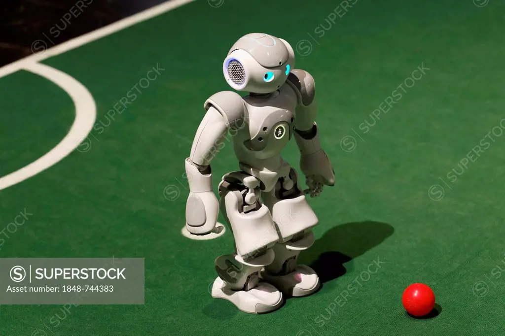 NAO playing football, a humanoid robot from Aldebaran Robotics, IdeenPark 2012, technology and education summit conference for young people, Essen, Ru...
