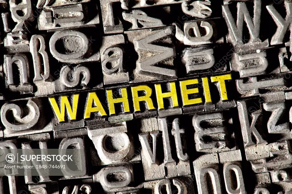 Old lead letters forming the word WAHRHEIT, German for TRUTH
