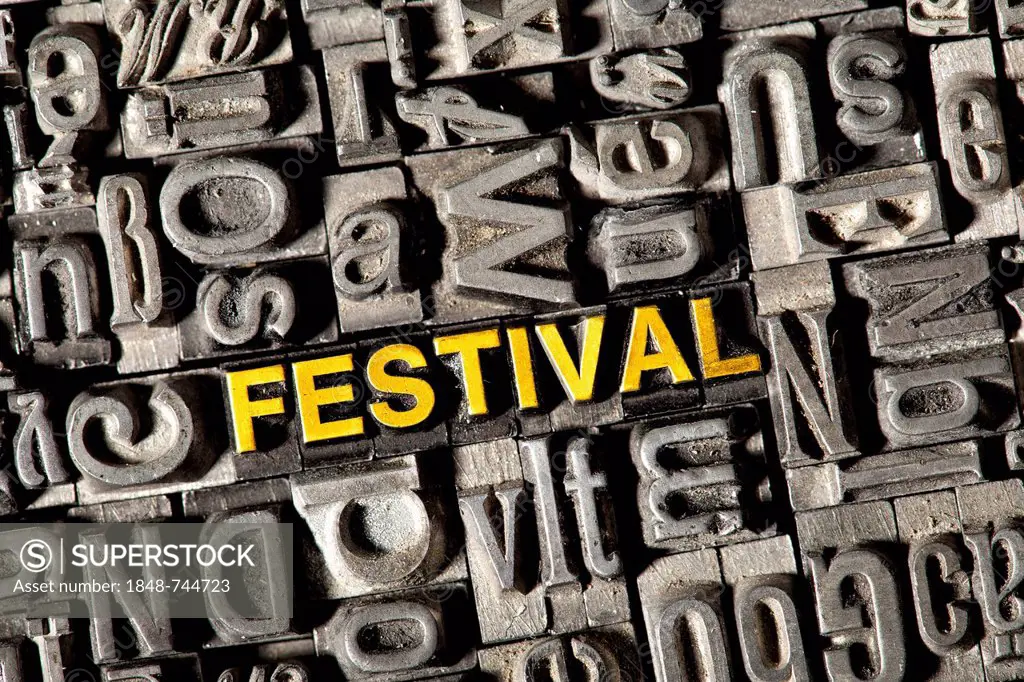 Old lead letters forming the word FESTIVAL
