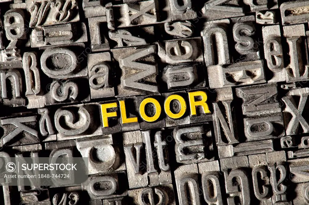 Old lead letters forming the word FLOOR