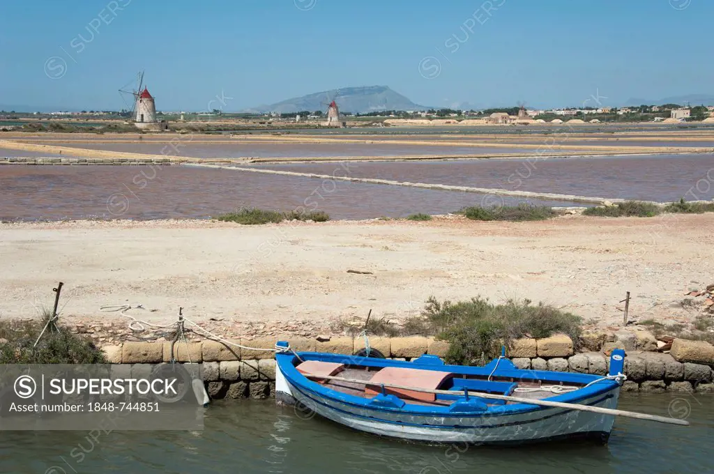 Boats and windmills, salines of Marsala, Trapani Province, Sicily, Italy, Europe