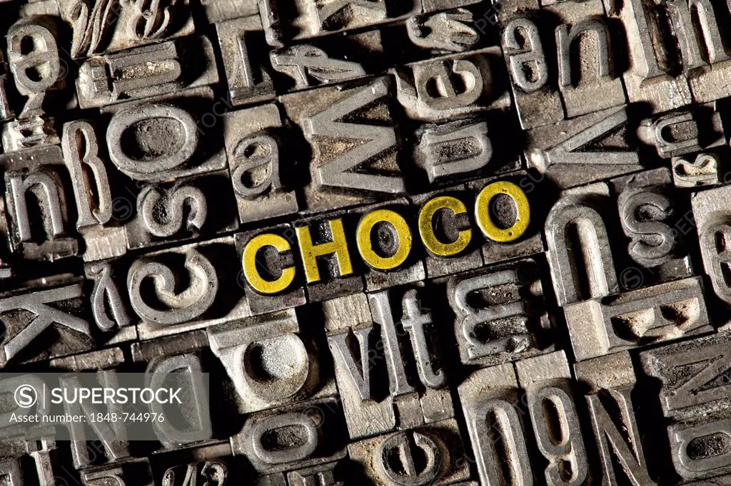 Old lead letters forming the word CHOCO