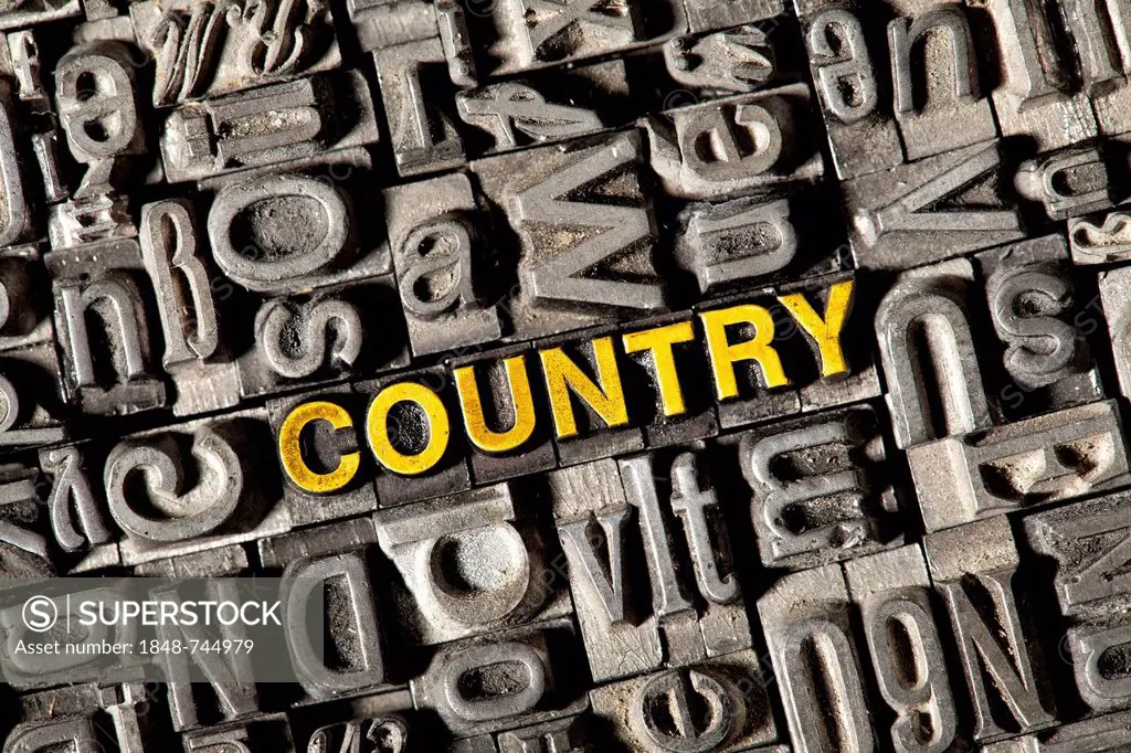 Old lead letters forming the word COUNTRY
