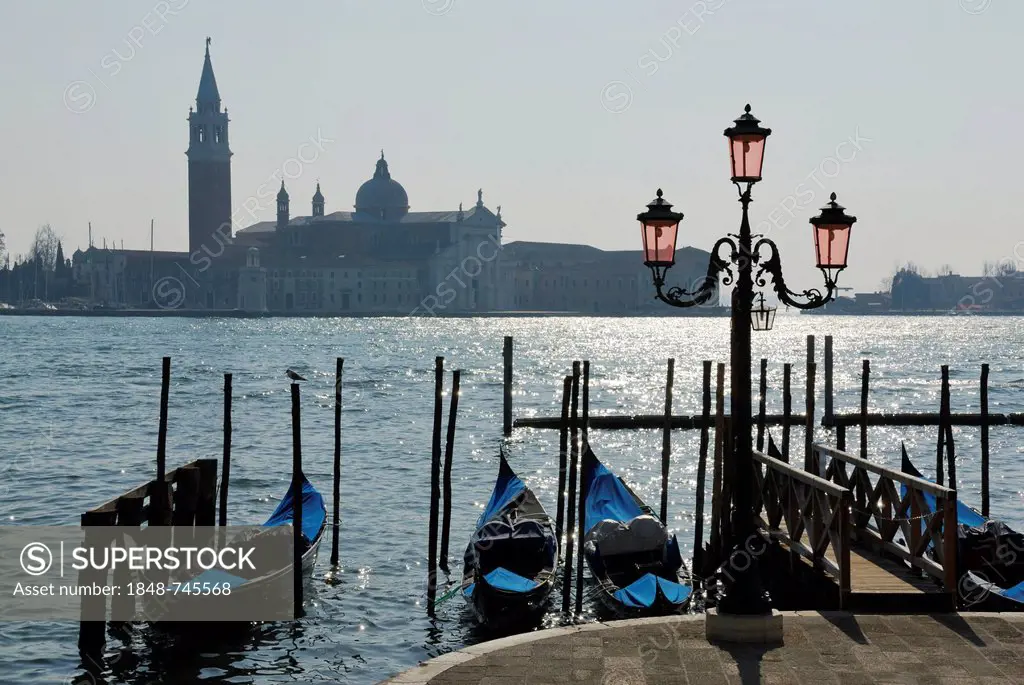 Gondolas, looking towards the Church of San Giorgio Maggiore, Molo della Piazzetta San Marco, St. Mark's Square, Venice, Venezia, Veneto, Italy, Europ...