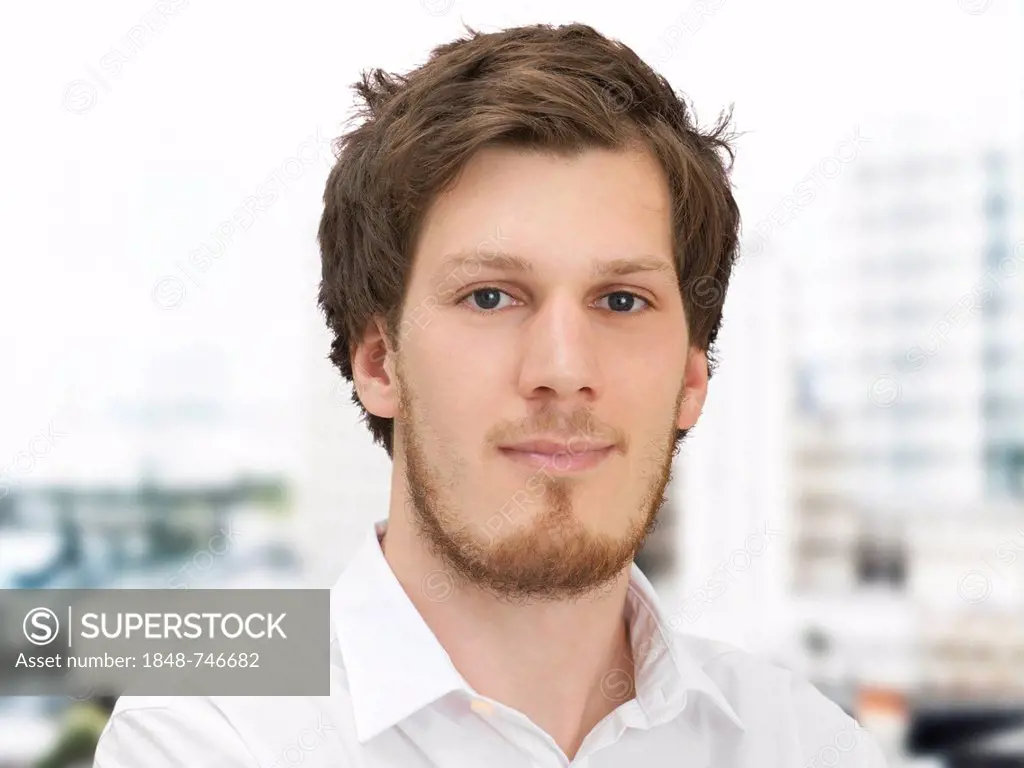 Portrait of a young man, looking calm, relaxed, serious