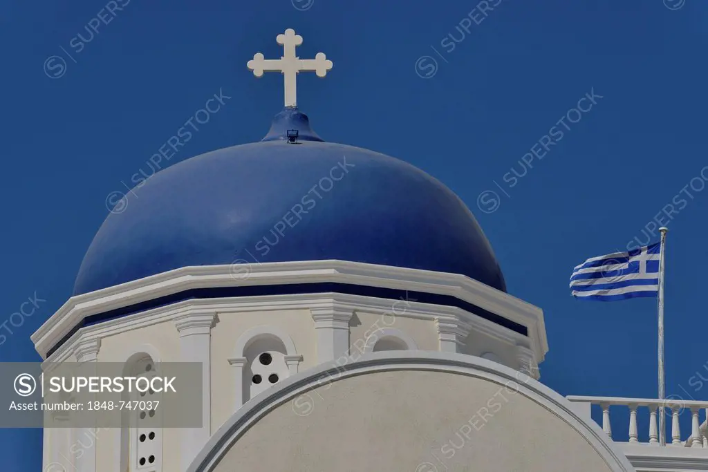 Greek flag flying next to a bright blue church dome, Karterádos, Santorini, Cyclades, Greek island, Greece, Europe