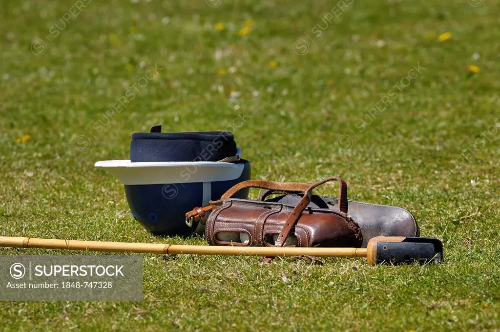 Polo gear lying on the lawn, a polo helmet, polo balls in a quiver and a mallet, Bucherer Polo Trophy 2011, Munich, Thann, Holzkirchen, Upper Bavaria,...