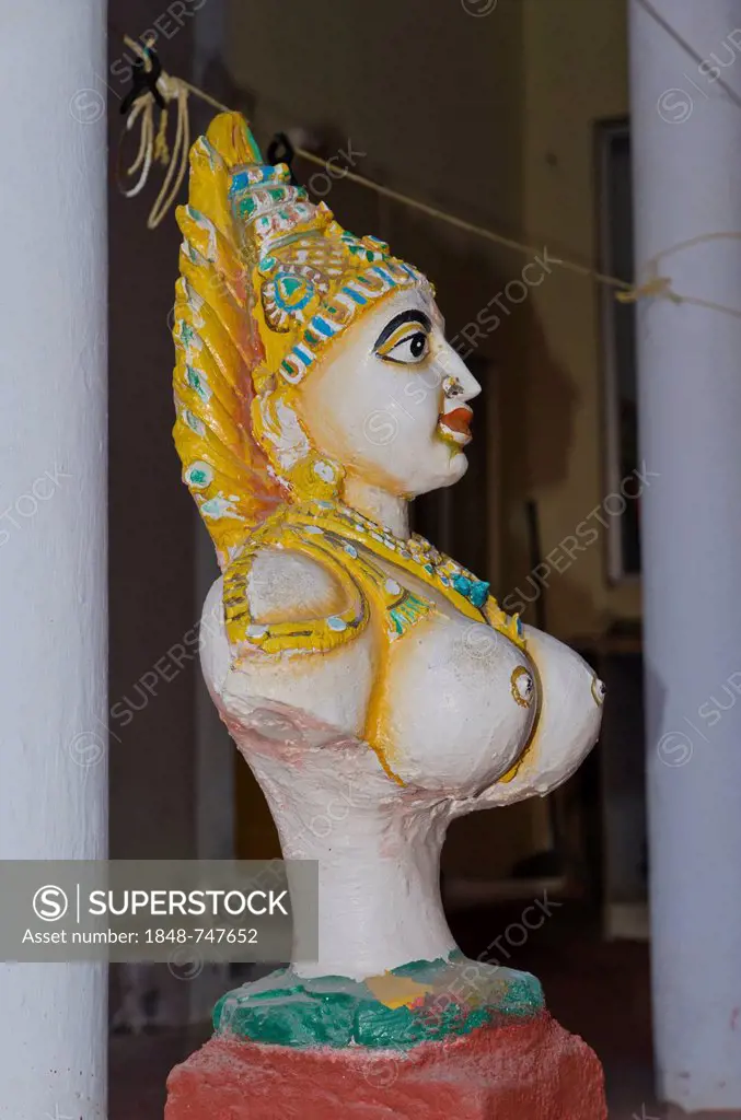 White sculpture of an unknown goddess, Mahabalipuram, India, Asia