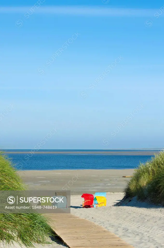 Colourful beach chairs on the beach of Utersum, Foehr island, North Frisia, Schleswig-Holstein, Germany, Europe
