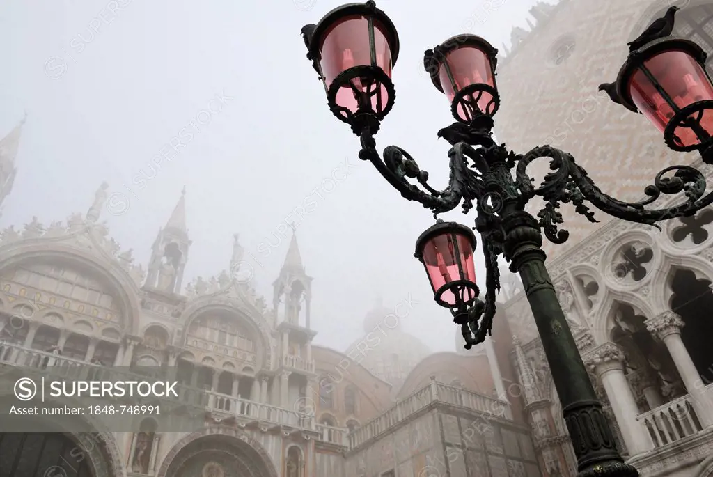 Street lamps, St Mark's Basilica in the mist, St. Mark's Square, Venice, Veneto, Italy, Europe