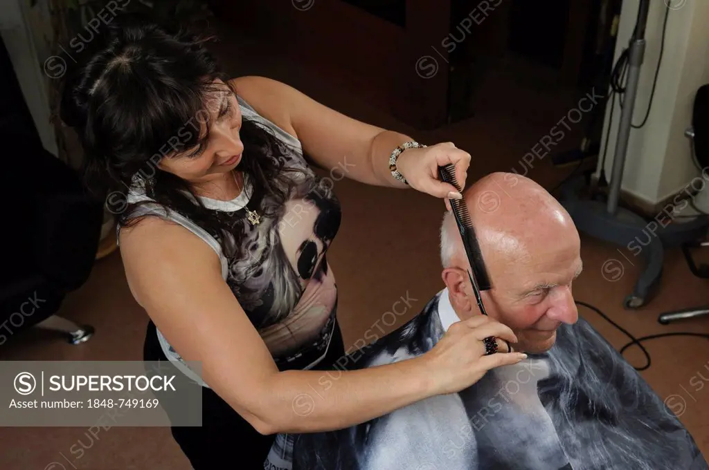 Elderly man at a hairdresser's, hair cutting, Baden-Wuerttemberg, Germany, Europe