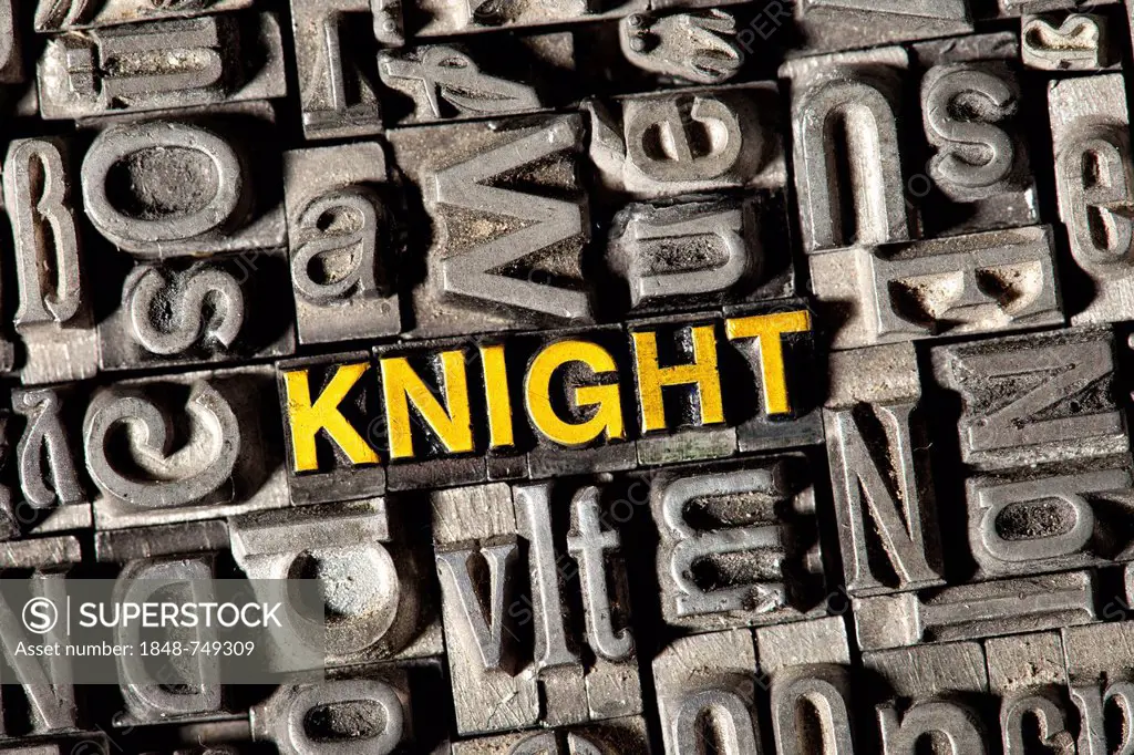 Old lead letters forming the word KNIGHT