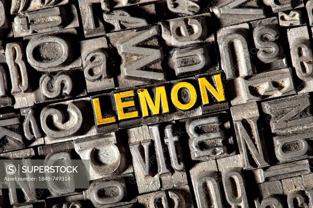 Old lead letters forming the word LEMON