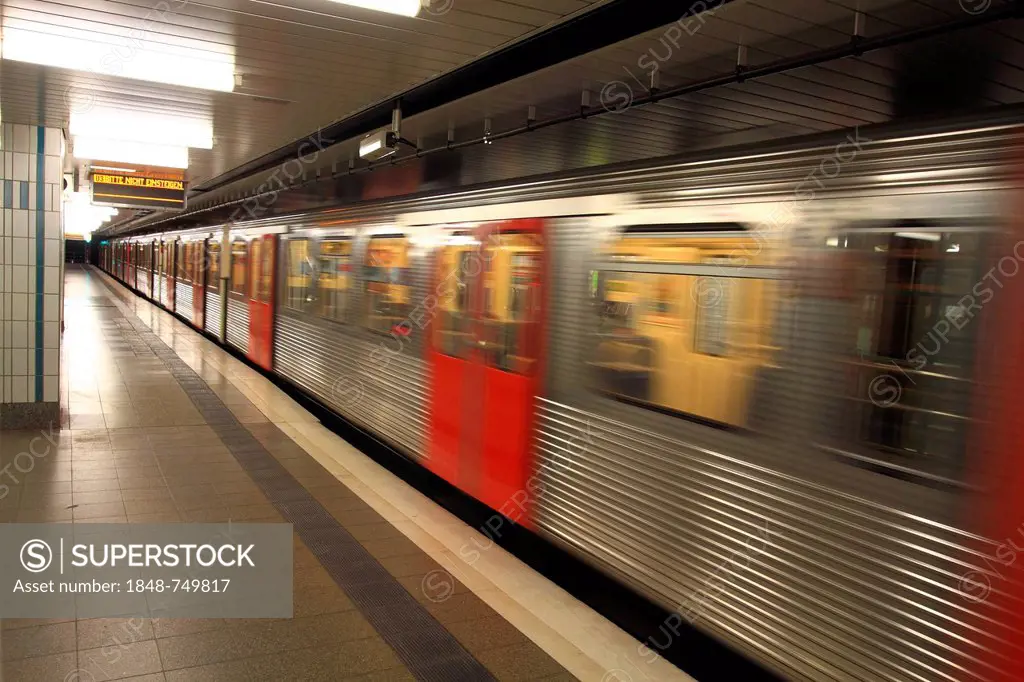 Subway station with arriving train, Hamburg, Germany, Europe