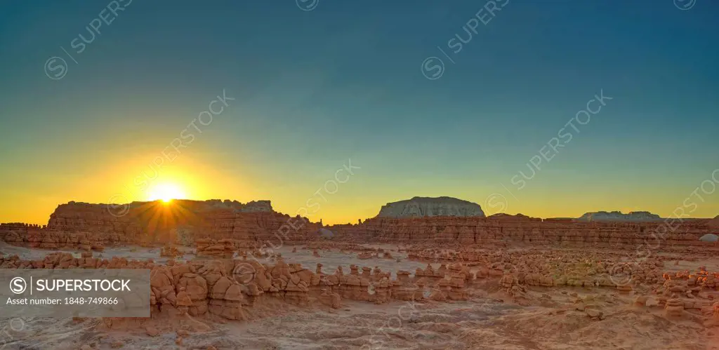 Sunrise, eroded hoodoos and Entrada Sandstone rock formations, Goblins, Goblin Valley State Park, San Rafael Reef Desert, Utah, Southwestern USA, USA
