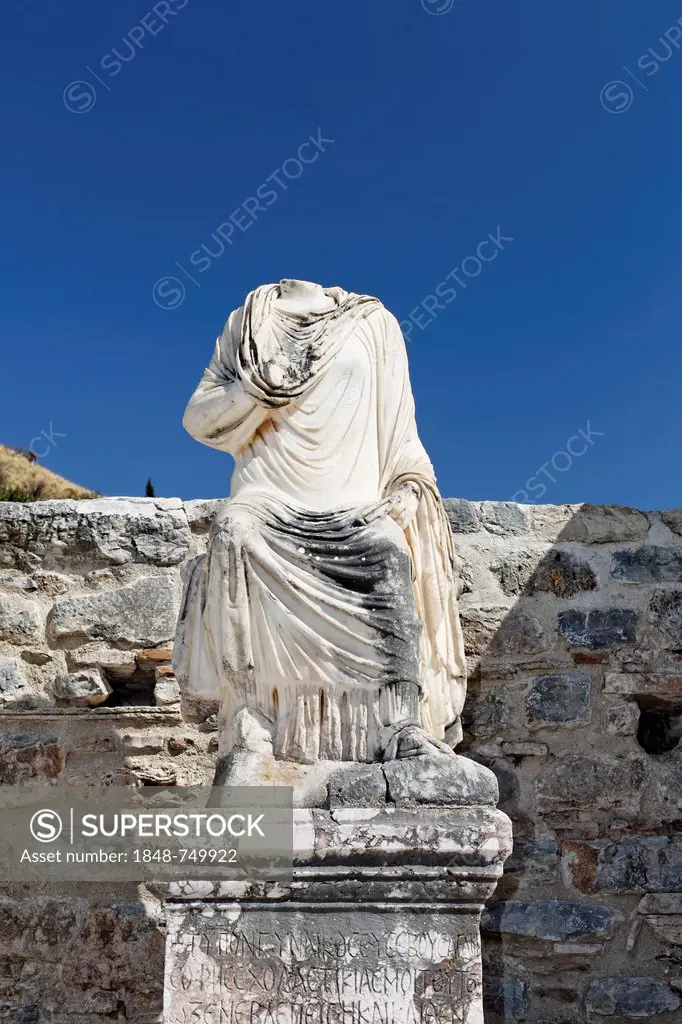 Headless torso in Curetes Street, UNESCO World Heritage Site, Ephesus, Ephesos, Efes, Izmir, Turkish Aegean, western Turkey, Turkey, Asia
