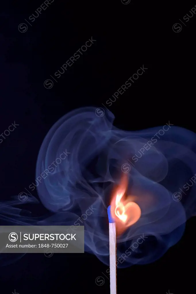 Matchstick being ignited, with blue smoke