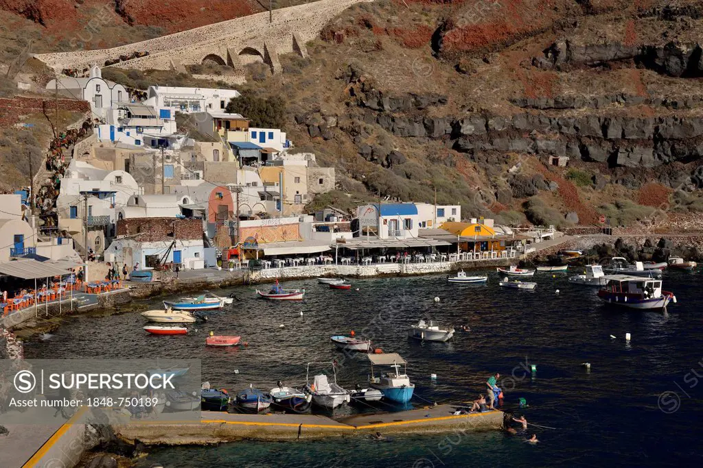 Fishing boats in the harbour of Ammoúdi, near Oía, Santorini, Cyclades, Greek Islands, Greece, Europe