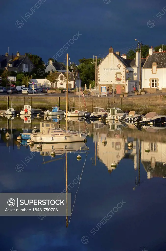 Houses and boats reflected in the eastern harbor in the early morning, Port-Haliguen in Quiberon, southern Brittany, Bretagne, France, Europe