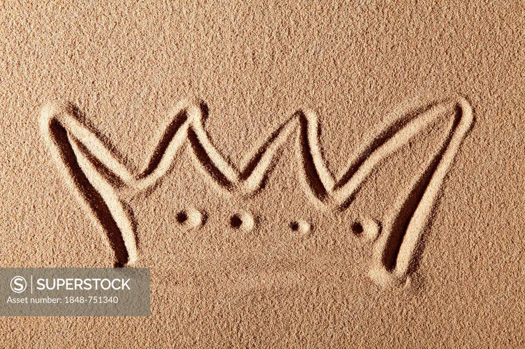 Crown painted in the sand