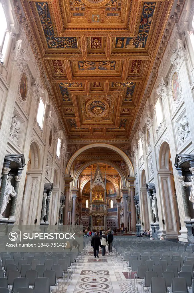 Catholic Christianity, Baroque era, large interior, coffered ceiling, church of San Giovanni in Laterano, St. John Lateran, Lateran, Rome, Lazio, Ital...