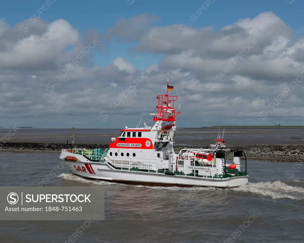 Bernard Gruben, a SAR ship, sea rescue ship leaving the pier in Norddeich drining into the Wadden Sea, Lower Saxony, Germany, Europe