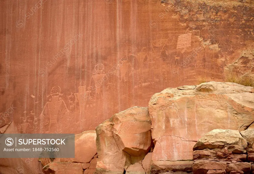 Petroglyphs etched in sandstone, symbols, mural paintings, depicting Fremont, Anasazi, Navajo and Anglo-Saxon cultures, prehistoric and historic rock ...