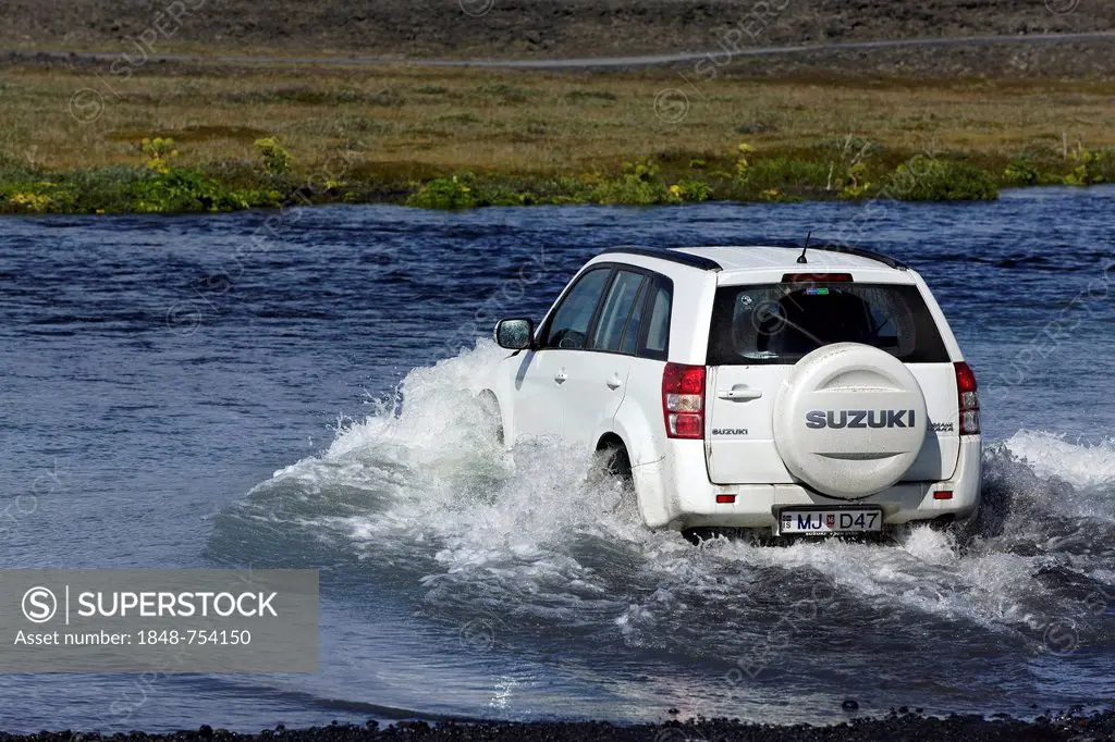 4WD crossing the Lindaá river, highlands, Iceland, Europe