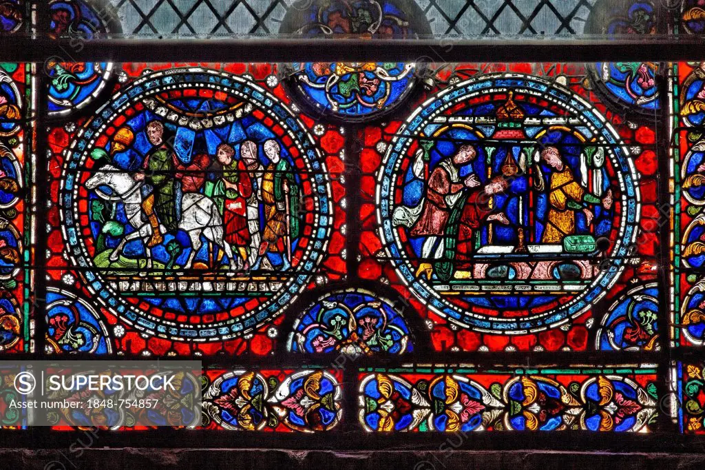 Stained-glass window in the choir with a representation of pilgrims attending the grave of Thomas Becket, Canterbury Cathedral, South East England, ad...