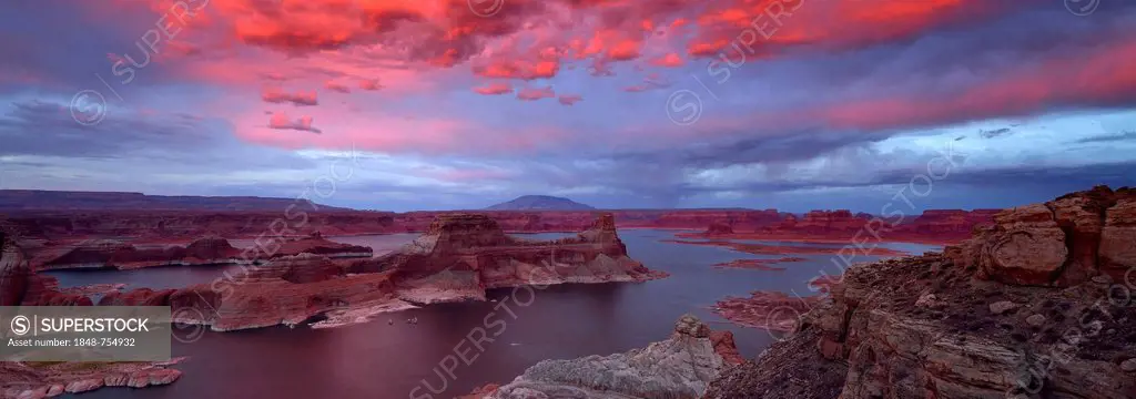 Panoramic view, view after sunset from Alstrom Point to Lake Powell illuminated by clouds, Padre Bay with Gunsight Butte and Navajo Mountain, Bigwater...