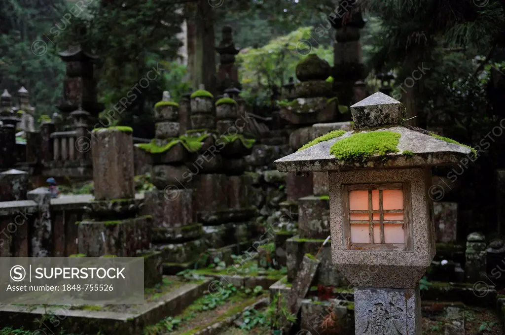 Lit stone lantern, Okuno-in, the most famous cemetery in Japan, UNESCO World Heritage Site, Koya-san, Wakayama, near Osaka, Japan, East Asia
