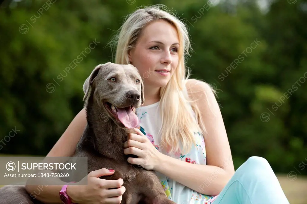 Woman with a Labrador Retriever