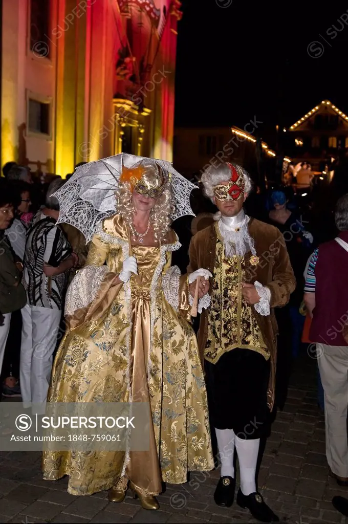 Parade of mask wearers in front of the historic municipal church, Venetian Fair, on the historic Marktplatz market square, Ludwigsburg, Baden-Wuerttem...