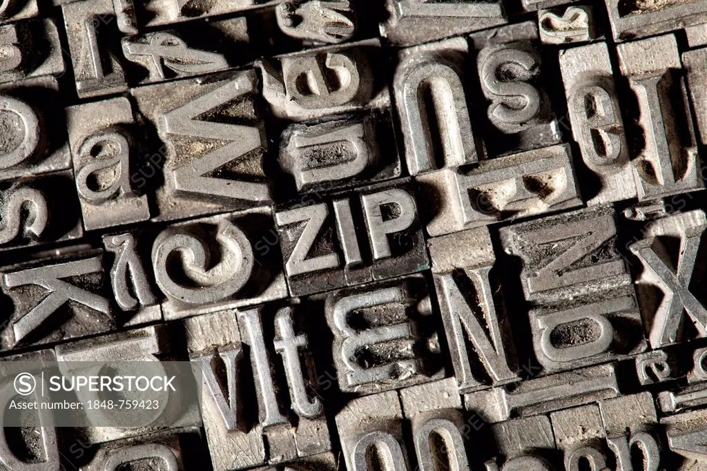 Old lead letters forming the word ZIP