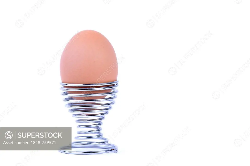 Brown egg in egg cup