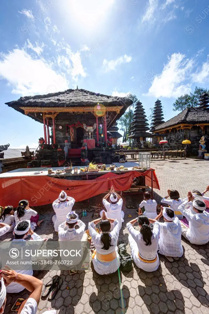 Hindu worshippers praying at Pura Ulun Danu Batur Temple
