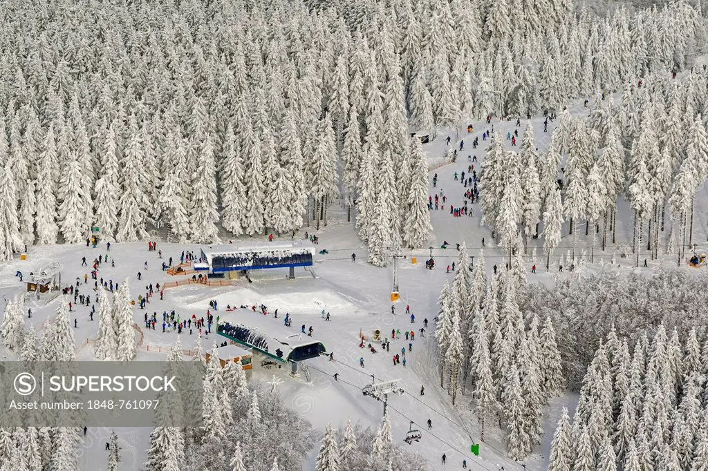 Aerial view, mountain station of the ski lift in winter
