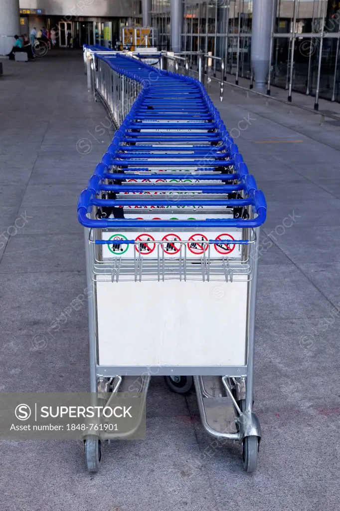 Luggage trolleys at the airport, Málaga, Andalusia, Spain, Europe