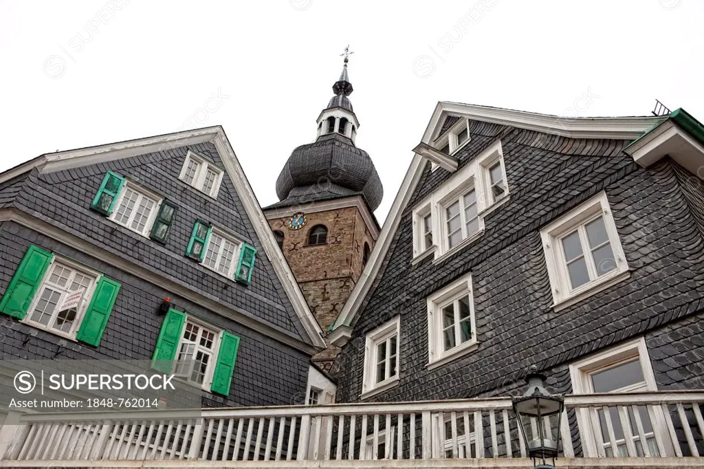 Protestant parish church with houses with slate fronts in the historic town centre of Lennep, Remscheid, Bergisches Land region, North Rhine-Westphali...