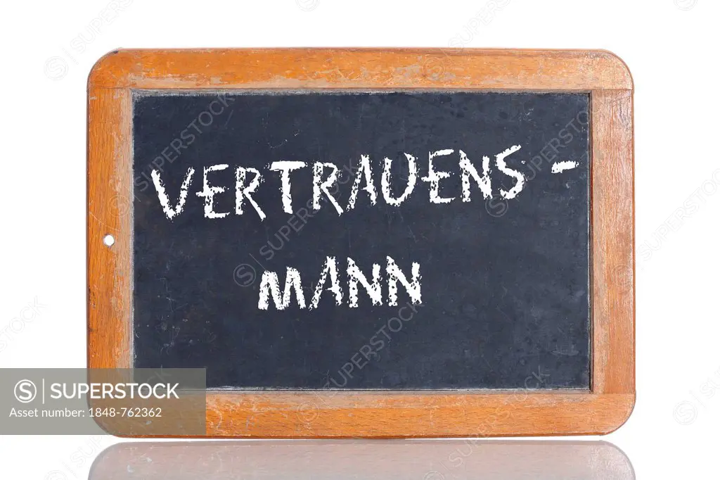 Old school blackboard with the term VERTRAUENSMANN, German for man of confidence or confidant