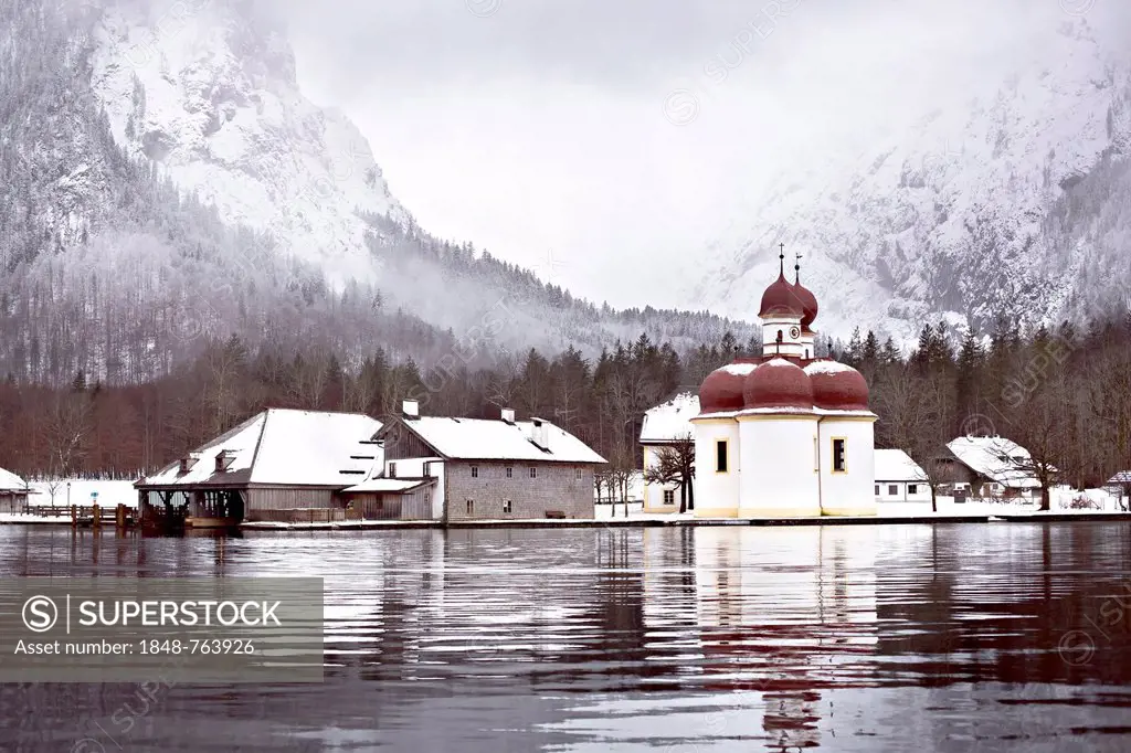 Pilgrimage Chapel of St. Bartholomew at Lake Koenigssee in the Alps in winter, Bavaria, Germany, Europe