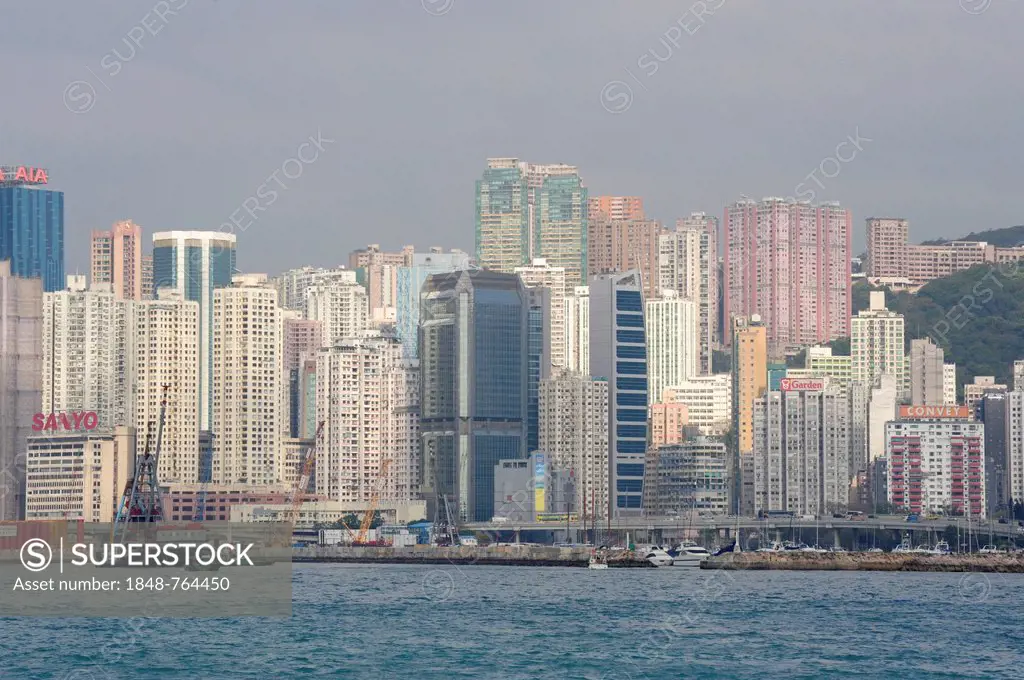 View of Victoria Harbour and skyscrapers in Fortress Hill and Causeway Bay, Eastern District, Hong Kong Island, Hong Kong, China, Asia