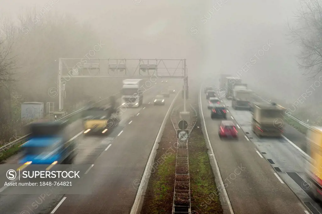 Traffic flow on a highway in the fog, Grevenbroich, North Rhine-Westphalia, Germany, Europe