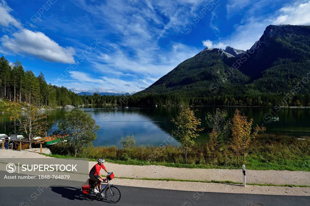 Cyclist at Hintersee lake, Ramsau, Berchtesgaden, Upper Bavaria, Bavaria, Germany, Europe