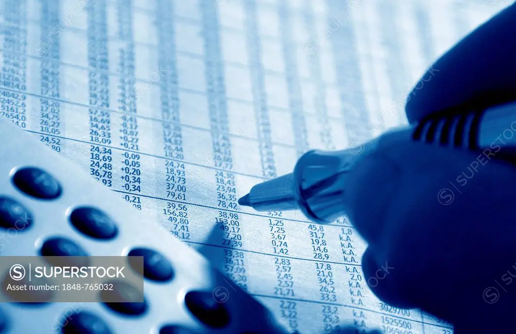 Pen marking stock prices, financial markets, stock exchange